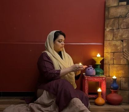 A moment of quiet contemplation during my performance for 'woman ki baat'. The simple act of lighting a lamp can be a powerful theatrical gesture.