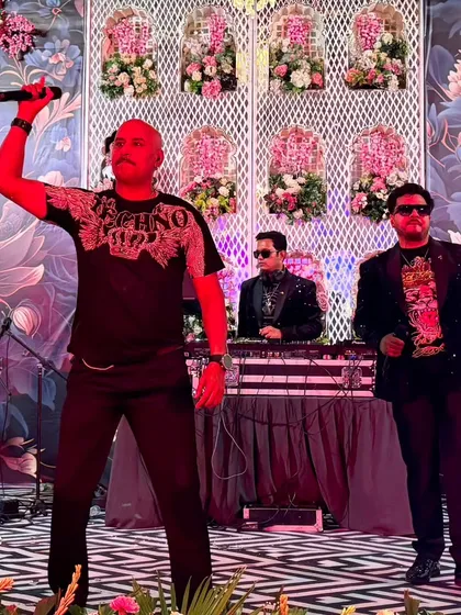Our singer and DJ hyping up the crowd during a cocktail event. My team includes talented performers who know how to create an electric atmosphere for any big fat Indian wedding.