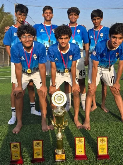 Another angle of our successful U-15 team celebrating their tournament victory.