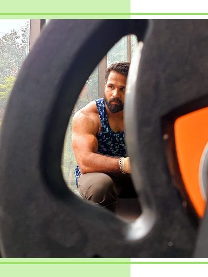 Make them stop and stare. A creative shot during an arm workout, because the gym is also about finding your confidence.