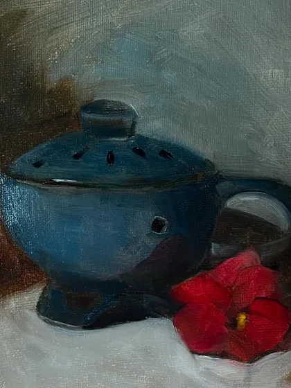 A still life study in oil, painted from life. I really enjoyed capturing the essence of this blue ceramic pot and red flower, focusing on color and light rather than just copying what I saw.