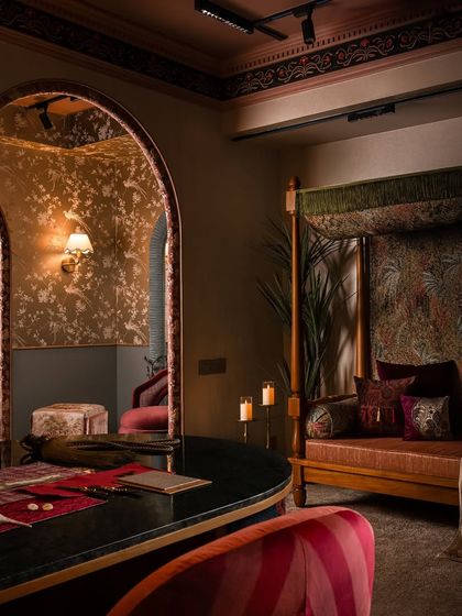 This is Zone Three, where the mood becomes bold, expressive, and maximalist. It’s the heart of the studio, designed for conversation with its deep colors, rich materials like Udaipur green marble, and dramatic, custom-designed furniture.