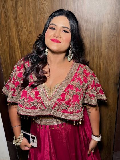 A close-up of the makeup, showing the flawless base and the bright, cheerful lip color.