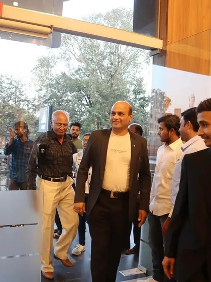 Arriving at the gallery for the inauguration ceremony, ready to celebrate the work of fellow artists.