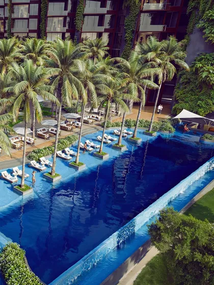 The infinity pool at the Westin Nashik. The design takes full advantage of the waterfront location, offering guests a stunning visual connection to the water and surrounding hills.