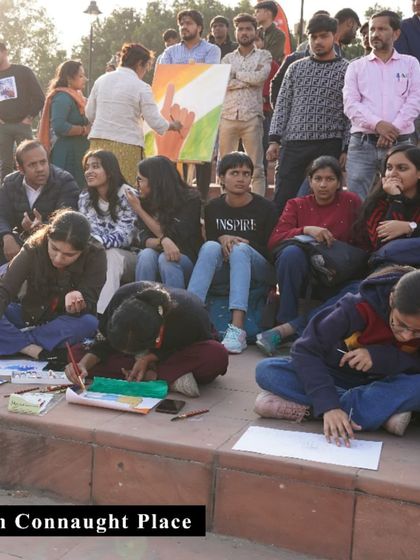 A wide view of the artists and crowd gathered at our Connaught Place event. It was a fantastic day of creativity, community engagement, and media interaction with News18.
