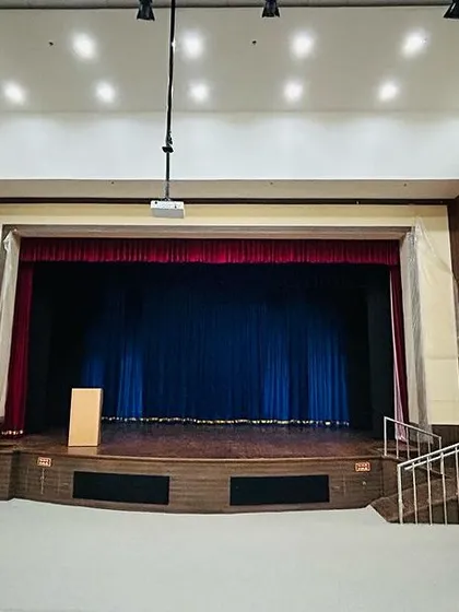 A look at the Jindal Group auditorium project during the final handover phase. This image shows the scale of our work, coordinating with architects and builders to integrate complex systems like stage lighting, projectors, and sound reinforcement.