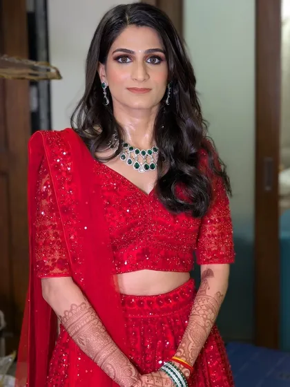 Another beautiful shot of Shriya, ready for her reception. The makeup was designed to be completely waterproof and transfer proof, ensuring it stayed perfect throughout the evening's celebrations.