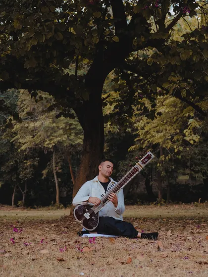 Finding a peaceful spot in a park to play. Music can be created anywhere, and nature is the best concert hall.
