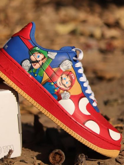 It's-a me, Mario! I painted the iconic Super Mario brothers, Mario and Luigi, on these colorful Nike By You Air Force 1s. The bright, playful design is perfect for any fan of the classic video game.
