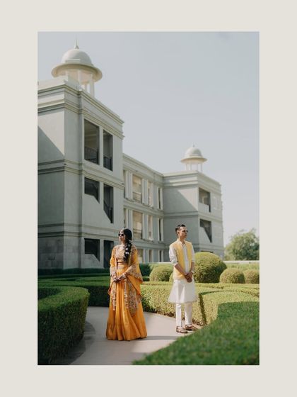 A classic portrait of Mehul and Divya from their Haldi. The composition and their poses exude a timeless elegance and sophistication.
