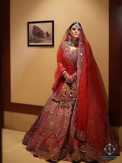 A full-length view of this stunning bride. My makeup is designed to look just as impactful from a distance, ensuring you are the center of attention from the moment you walk in.