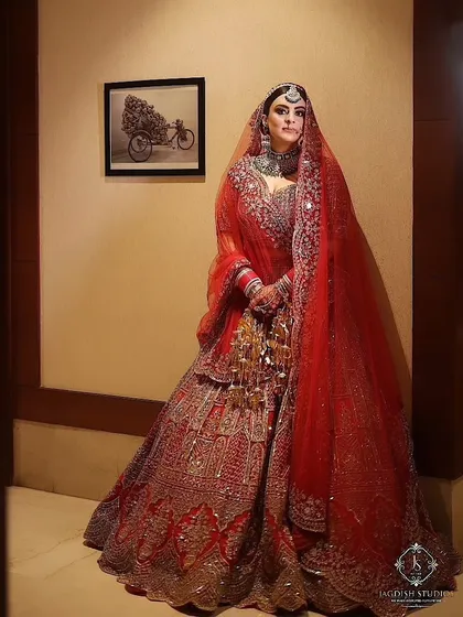 A full-length view of this stunning bride. My makeup is designed to look just as impactful from a distance, ensuring you are the center of attention from the moment you walk in.