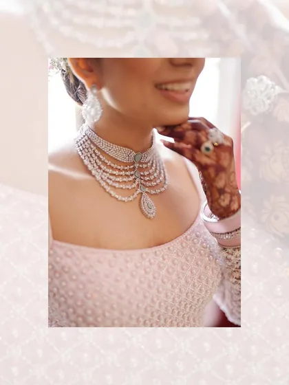 A close-up shot of the bride's stunning multi-layered pearl and diamond necklace. I believe in capturing the details that complete the bridal look.