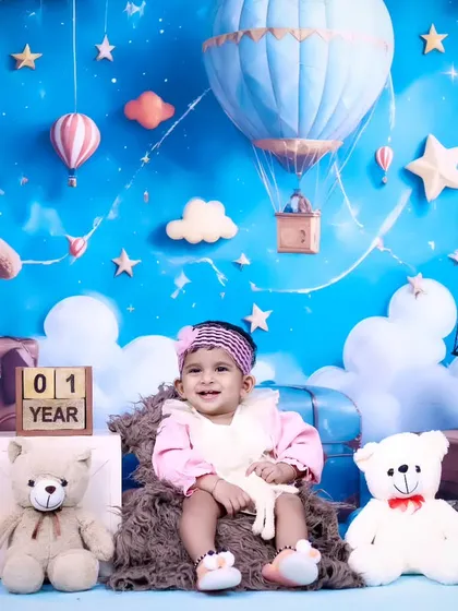 A wide shot of the one-year-old's teddy bear party, showing the full, festive setup.