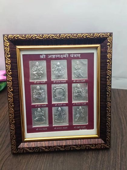 An Ashtalakshmi Yantram frame, featuring all eight forms of Goddess Lakshmi in 999 pure silver, a powerful symbol of wealth and prosperity.
