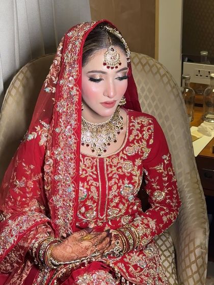 A portrait of Dr. Rehnnuma, showcasing her soft glam Nikkah makeup. The look features a flawless base, subtle smokey eyes, and beautiful contouring.