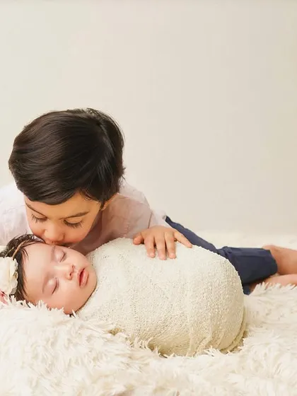 Another sweet kiss from a proud big brother. I always take the time to capture these unscripted gestures of affection.