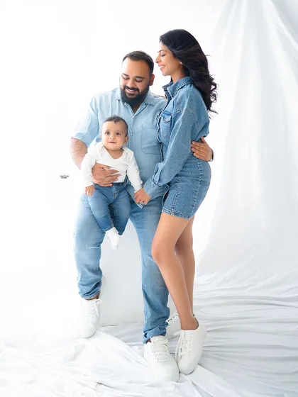 A fun family shot with everyone rocking a stylish denim-on-denim look.