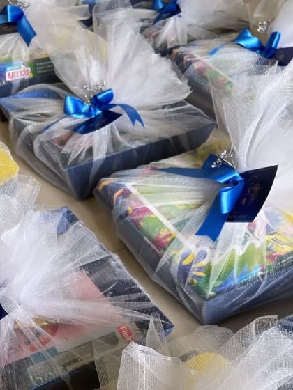 Unwrapping love, one gift at a time. Our elegant Trousseau Hampers are beautifully wrapped in delicate netting with satin ribbons, perfect for the most special moments.