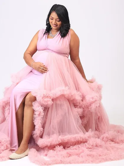 Another shot from the maternity session. The soft makeup ensures she looks and feels like herself, just more polished and glowing.