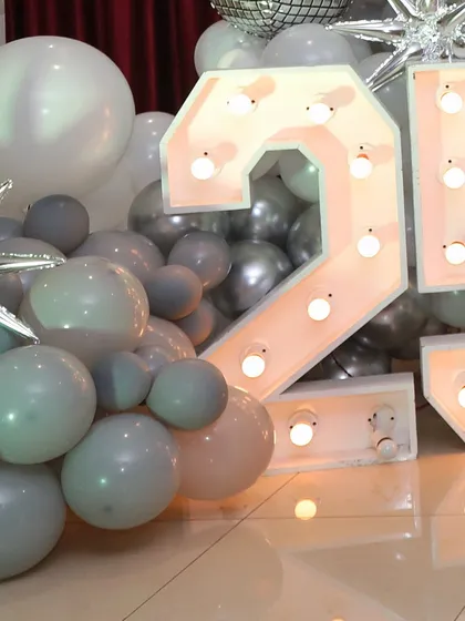 Large marquee numbers, here showing '25', are perfect for celebrating a milestone anniversary like a silver jubilee.