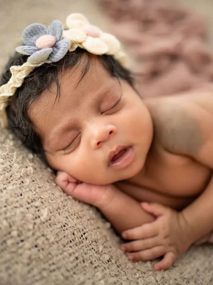 The way they rest their head on their little hands is just the sweetest thing. Capturing these natural sleeping positions makes for such lovely memories.