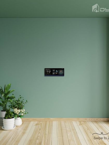 This wide shot shows the HomePad in a room, giving a sense of its scale and how it integrates into a living space without overwhelming it.