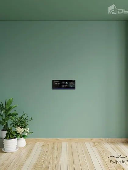 This wide shot shows the HomePad in a room, giving a sense of its scale and how it integrates into a living space without overwhelming it.