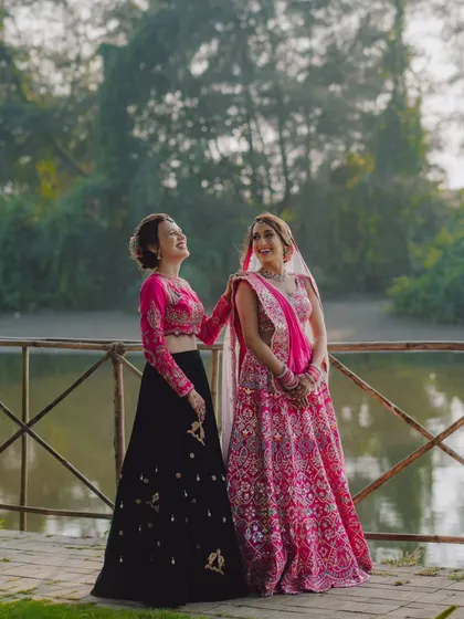 A candid moment of laughter between the bride and her sister or best friend. These are the precious, unscripted interactions that tell the story of their bond.