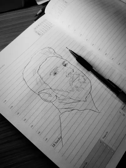 A work-in-progress line drawing of Lionel Messi, sketched in my diary during the World Cup.