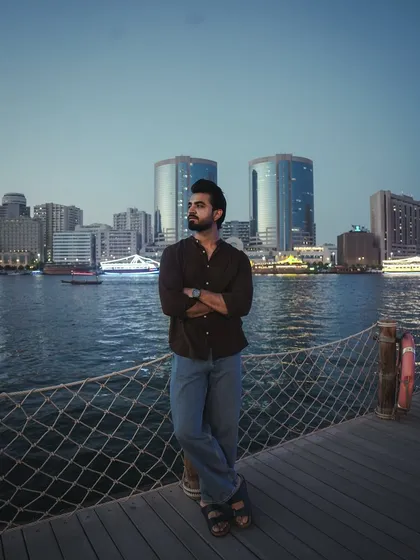 Posing by the Dubai Creek with the skyline in the background. These are the views that make a destination wedding truly epic.