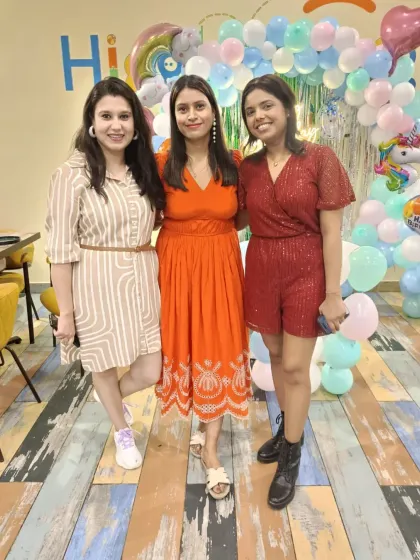 Three friends posing for a photo. The stylish decor and fun atmosphere make for great pictures.
