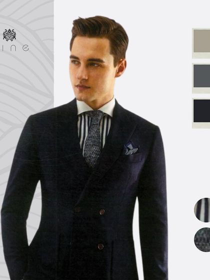A classic navy double-breasted suit, paired with a striped shirt and patterned tie. This is a timeless combination for any formal requirement.