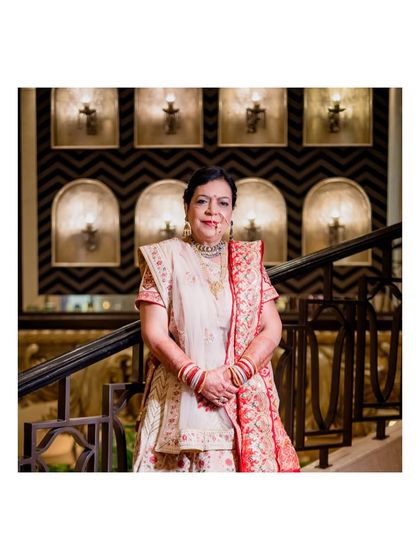 An elegant portrait of the bride from the 50th-anniversary celebration, her grace and joy shining through.