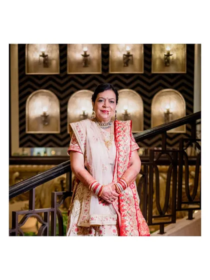 An elegant portrait of the bride from the 50th-anniversary celebration, her grace and joy shining through.