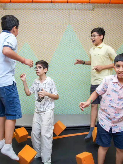 Jumping for joy on the trampoline! This is a favorite spot for kids to burn off energy and have a blast with their friends.