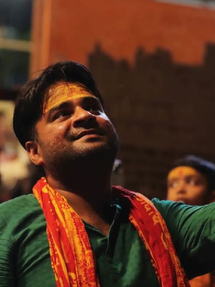 A devotee captures our drone show on his phone at the Varanasi ghats. The blend of ancient tradition and modern technology created a truly unique and memorable spiritual experience.