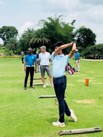 Our coaches are constantly on the range, providing hands-on instruction. From demonstrating a swing path to analyzing a student's setup, these moments of direct mentorship are where real progress is made.