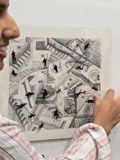 Shreya presenting her finished piece. Her work powerfully questions whether the identity of a space comes from its physical form or the people who bring it to life.