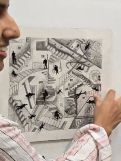 Shreya presenting her finished piece. Her work powerfully questions whether the identity of a space comes from its physical form or the people who bring it to life.