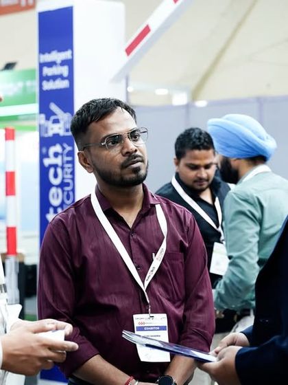 Our team engaging with visitors at the Traffic Infra Tech Expo 2023, providing detailed explanations of our security and entrance products.