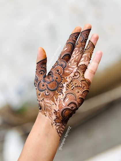 The full view of a design I did for myself, combining delicate leaves with bold floral motifs.