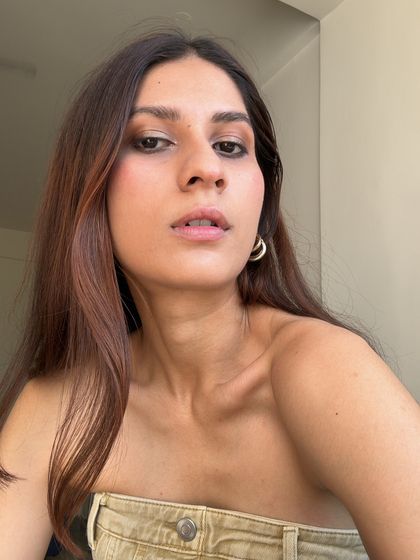 A simple and summery look featuring a khaki tube top and a smokey eye. Sometimes, less is more.