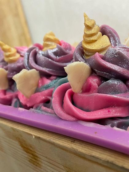 The details on the Unicorn soap loaf are all piped by hand.