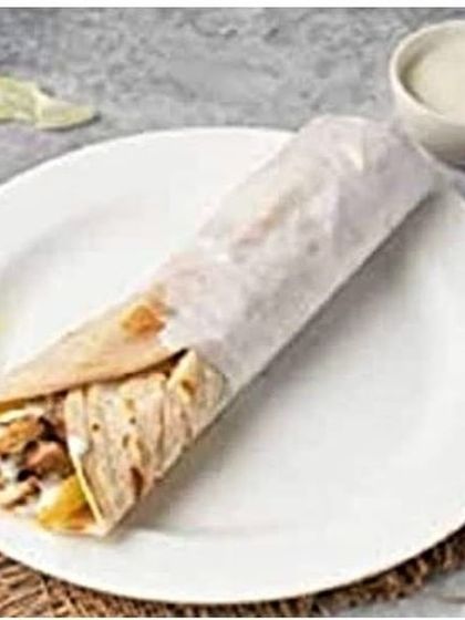 Here is a fully wrapped shawarma roll, ready to go. It's easy to eat on the move and keeps all the delicious fillings and sauces contained.