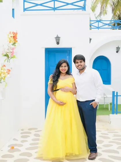 Sunshine and new beginnings. This bright yellow tulle gown brings so much joy to a maternity shoot, especially against a vibrant, picturesque backdrop. We also styled the dad-to-be in a crisp white shirt to create a fresh, coordinated couple's look.