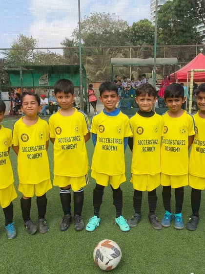 Rise up and shine! Our U-7 team posing for a picture on match day, looking ready and excited to play.