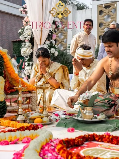 The couple seeking blessings during their wedding ceremony. I ensure the mandap area is designed to be both beautiful and functional for all the important rituals.