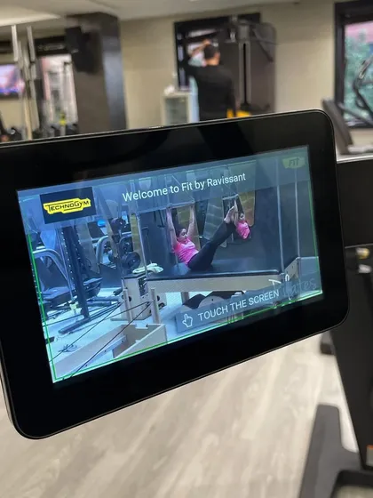 Our Technogym equipment features integrated screens that can guide you through exercises. It's just one of the ways I use technology to enhance your workout experience.